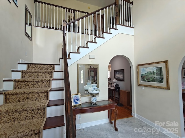 509 E Main St, Rockwell, NC 28138 - stairs featuring arched walkways and a high ceiling