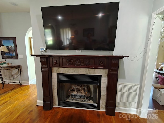 509 E Main St, Rockwell, NC 28138 - detailed view of a high end fireplace, arched walkways, and wood finished floors