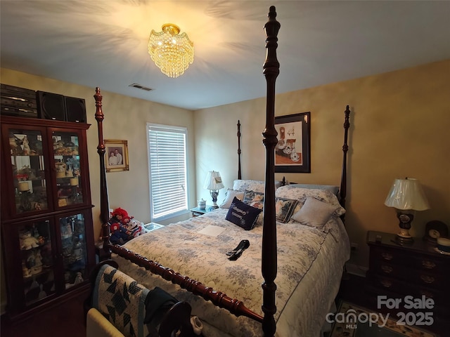 509 E Main St, Rockwell, NC 28138 - bedroom featuring a chandelier