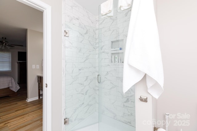 2949 Glenstone Dr, Rock Hill, SC 29730 - ensuite bathroom featuring a stall shower, wood finished floors, and a ceiling fan