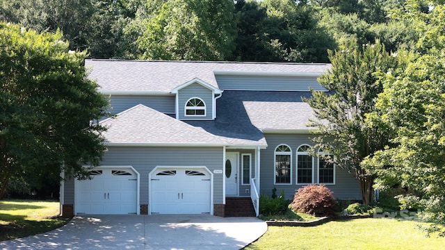 2949 Glenstone Dr, Rock Hill, SC 29730 - view of front of home featuring a garage, driveway, a front lawn, and a shingled roof