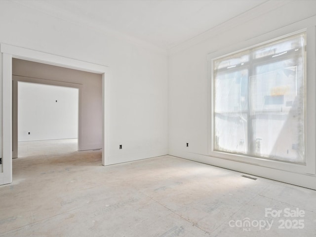 8018 Fairmont Dr, Waxhaw, NC 28173 - spare room featuring ornamental molding