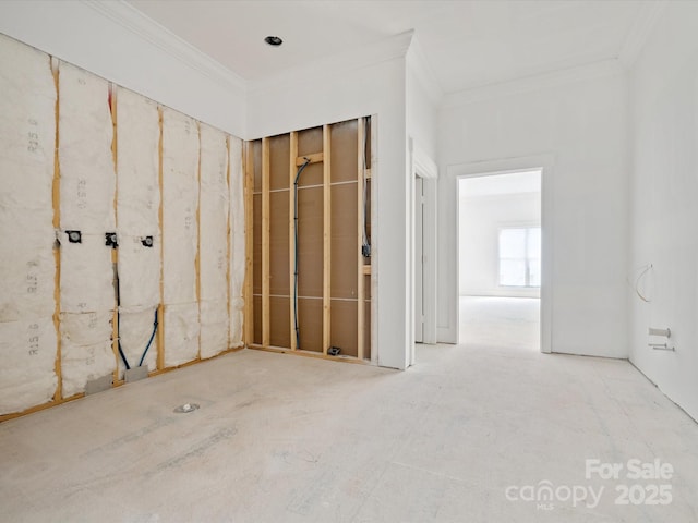 8018 Fairmont Dr, Waxhaw, NC 28173 - spare room featuring crown molding