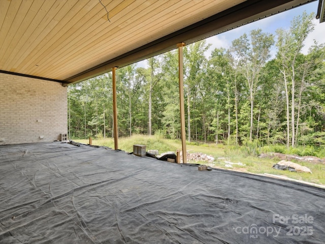 8018 Fairmont Dr, Waxhaw, NC 28173 - view of patio with a wooded view