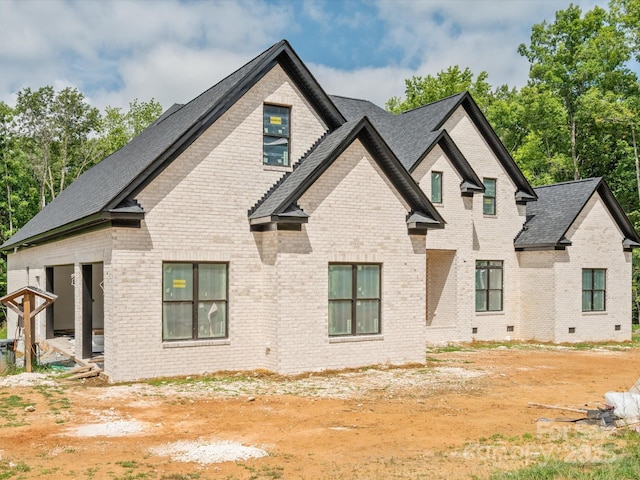 8018 Fairmont Dr, Waxhaw, NC 28173 - rear view of property featuring brick siding, a shingled roof, and crawl space
