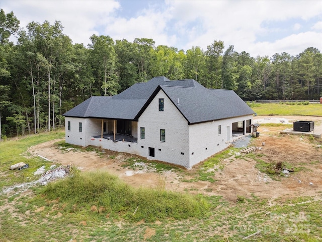 8018 Fairmont Dr, Waxhaw, NC 28173 - view of home's exterior with roof with shingles and a central air condition unit