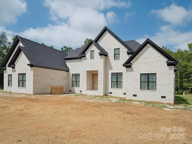 8018 Fairmont Dr, Waxhaw, NC 28173 - view of front of house with brick siding, crawl space, and a shingled roof