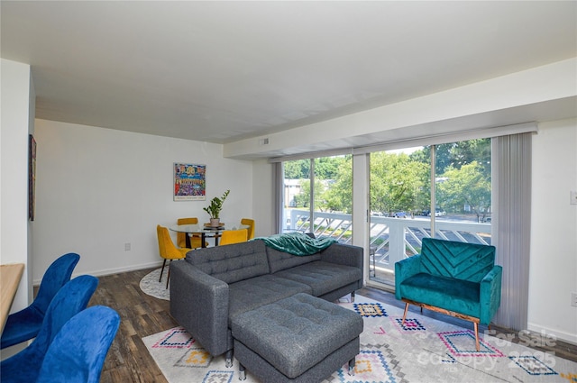 9325 Old Concord Rd Unit J, Charlotte, NC 28213 - living area featuring wood finished floors and plenty of natural light