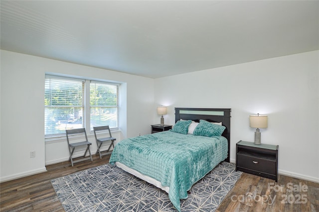 9325 Old Concord Rd Unit J, Charlotte, NC 28213 - bedroom featuring wood finished floors and baseboards