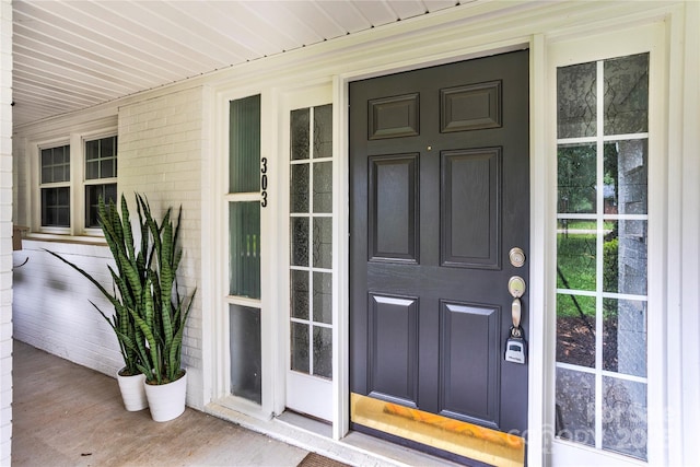 303 Odell St, Kannapolis, NC 28083 - view of exterior entry featuring a porch