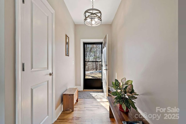 244 Timberlake Rd, Bostic, NC 28018 - doorway to outside featuring light wood finished floors and baseboards