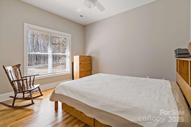 244 Timberlake Rd, Bostic, NC 28018 - bedroom featuring wood finished floors and a ceiling fan