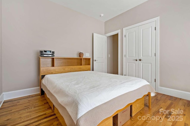 244 Timberlake Rd, Bostic, NC 28018 - bedroom featuring wood finished floors and a closet