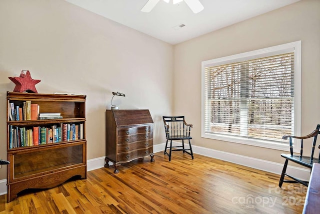 244 Timberlake Rd, Bostic, NC 28018 - living area with wood finished floors, plenty of natural light, and ceiling fan