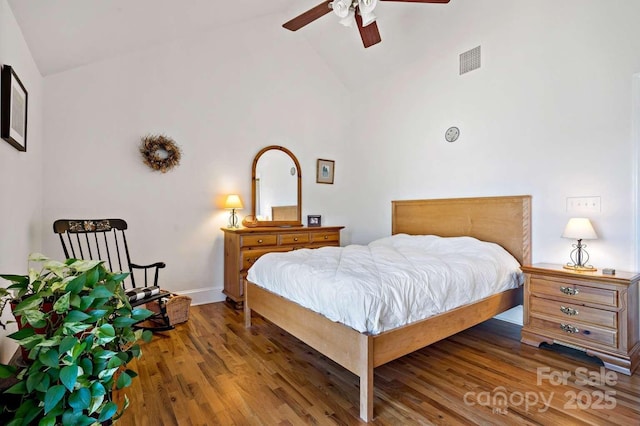244 Timberlake Rd, Bostic, NC 28018 - bedroom with wood finished floors, high vaulted ceiling, and a ceiling fan