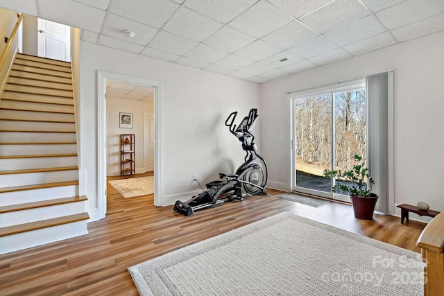 244 Timberlake Rd, Bostic, NC 28018 - workout area featuring a drop ceiling and wood finished floors