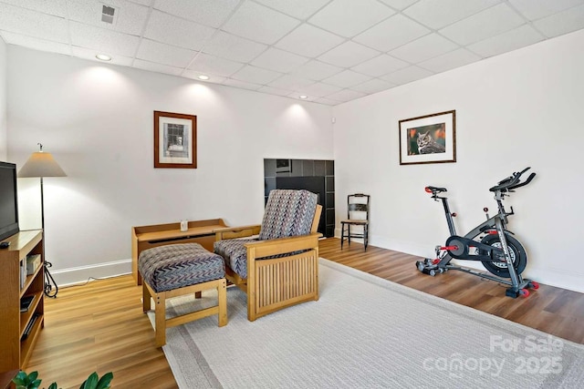 244 Timberlake Rd, Bostic, NC 28018 - sitting room with wood finished floors and a drop ceiling