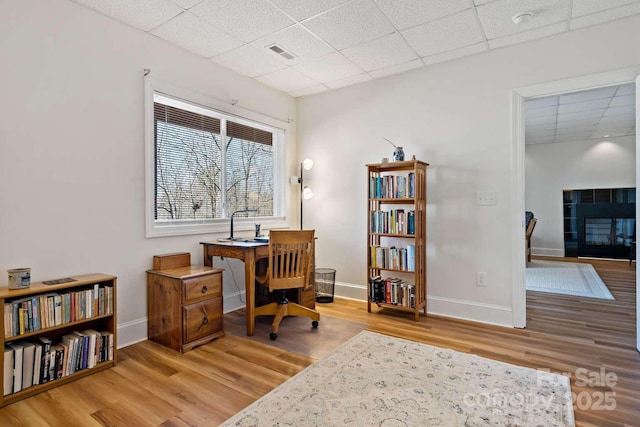 244 Timberlake Rd, Bostic, NC 28018 - home office with a drop ceiling and wood finished floors