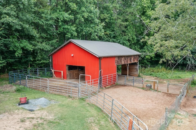 724 Teeter Rd, Mooresville, NC 28115 - horse barn featuring a view of trees