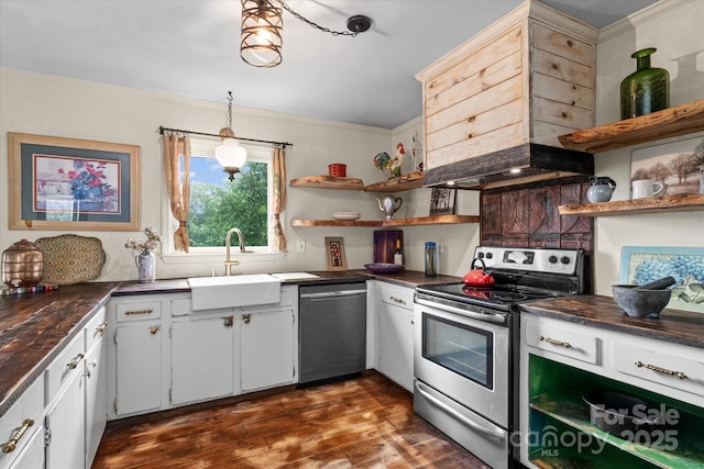 724 Teeter Rd, Mooresville, NC 28115 - kitchen featuring stainless steel appliances, open shelves, dark countertops, crown molding, and dark wood-style floors