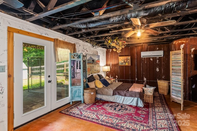 724 Teeter Rd, Mooresville, NC 28115 - bedroom with a wall mounted air conditioner, access to exterior, french doors, and concrete flooring