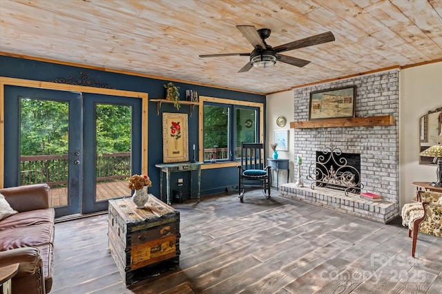 724 Teeter Rd, Mooresville, NC 28115 - living room featuring wooden ceiling, ceiling fan, a fireplace, wood finished floors, and ornamental molding