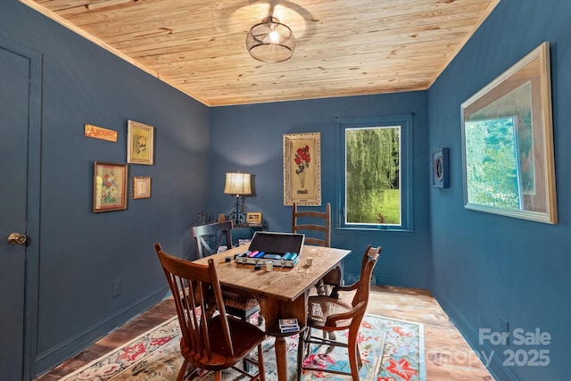 724 Teeter Rd, Mooresville, NC 28115 - dining space with wooden ceiling, wood finished floors, an office area, and crown molding