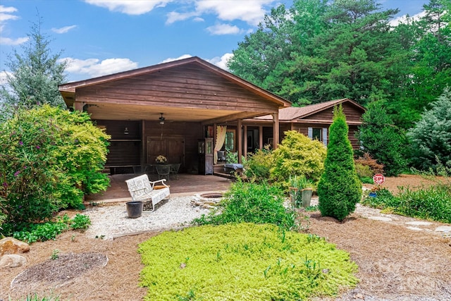 724 Teeter Rd, Mooresville, NC 28115 - view of front of house with a fire pit and a patio area