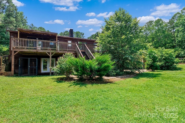 724 Teeter Rd, Mooresville, NC 28115 - back of house featuring a wooden deck, a chimney, stairs, and a lawn