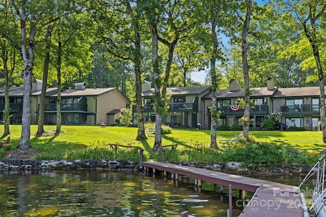 28 Toxaway Pt Unit B7, Lake Toxaway, NC 28747 - dock area featuring a yard, a residential view, and a water view