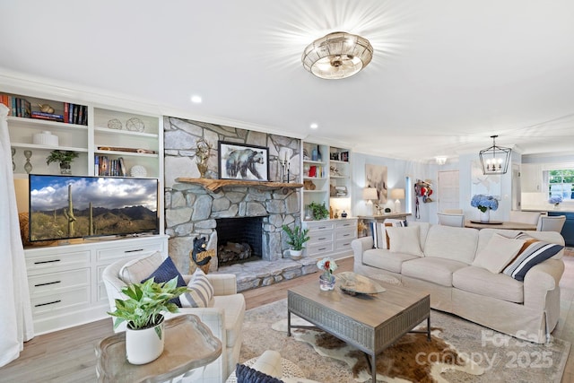 28 Toxaway Pt Unit B7, Lake Toxaway, NC 28747 - living room featuring a chandelier, a stone fireplace, and wood finished floors