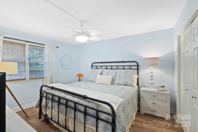 28 Toxaway Pt Unit B7, Lake Toxaway, NC 28747 - bedroom with a closet, wood finished floors, and ceiling fan