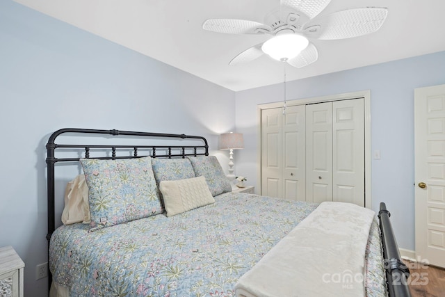 28 Toxaway Pt Unit B7, Lake Toxaway, NC 28747 - bedroom featuring a closet, wood finished floors, and a ceiling fan