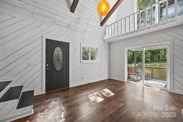 3276 Howard Gap Rd, Hendersonville, NC 28792 - foyer with wooden walls, wood finished floors, high vaulted ceiling, and beamed ceiling