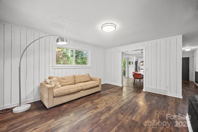 3276 Howard Gap Rd, Hendersonville, NC 28792 - living room with wood finished floors and healthy amount of natural light