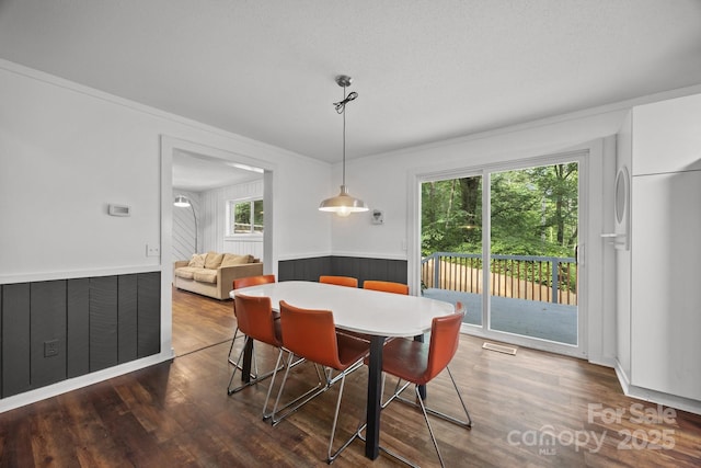 3276 Howard Gap Rd, Hendersonville, NC 28792 - dining room with wood finished floors and ornamental molding