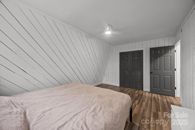 3276 Howard Gap Rd, Hendersonville, NC 28792 - bedroom featuring dark wood finished floors, a closet, and ceiling fan