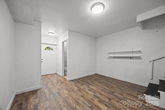 3276 Howard Gap Rd, Hendersonville, NC 28792 - unfurnished living room with wood finished floors and baseboards