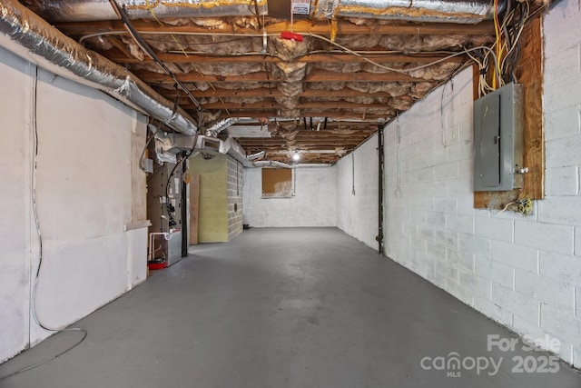 3276 Howard Gap Rd, Hendersonville, NC 28792 - unfinished basement featuring electric panel and heating unit