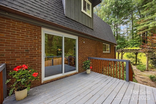 3276 Howard Gap Rd, Hendersonville, NC 28792 - wooden deck with a pergola