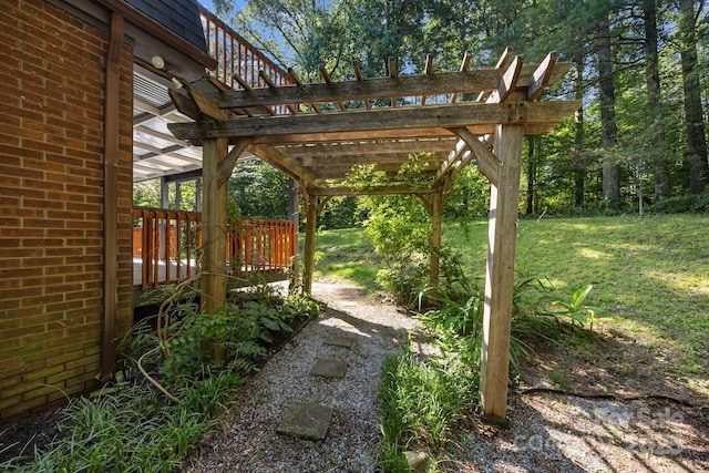 3276 Howard Gap Rd, Hendersonville, NC 28792 - view of grassy yard featuring a pergola and a deck