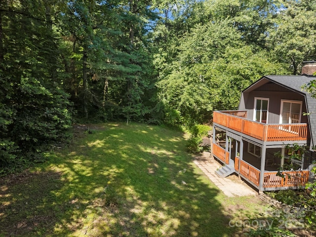 3276 Howard Gap Rd, Hendersonville, NC 28792 - view of grassy yard with a balcony and a wooded view
