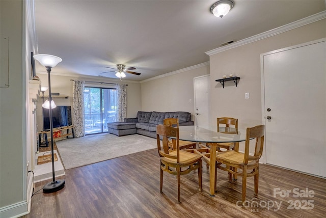 4130 Charlotte Hwy # G, Lake Wylie, SC 29710 - dining area with dark wood finished floors, ceiling fan, and ornamental molding