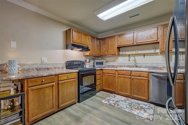 4130 Charlotte Hwy # G, Lake Wylie, SC 29710 - kitchen featuring stainless steel appliances, under cabinet range hood, open shelves, ornamental molding, and light wood-type flooring