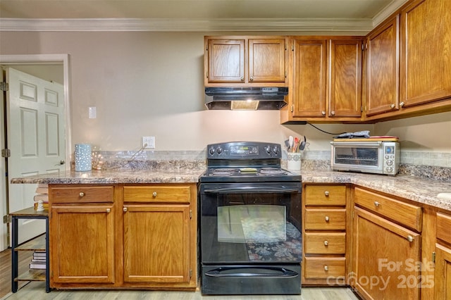 4130 Charlotte Hwy # G, Lake Wylie, SC 29710 - kitchen with black electric range oven, under cabinet range hood, light wood-style floors, crown molding, and brown cabinetry