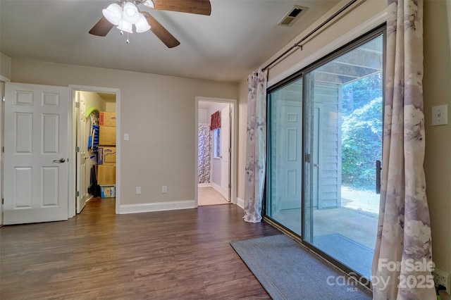 4130 Charlotte Hwy # G, Lake Wylie, SC 29710 - spare room featuring dark wood-style flooring and a ceiling fan