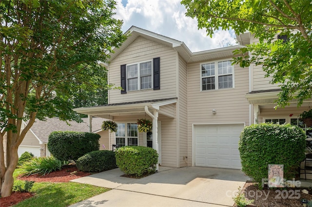 256 Farington Cir Unit 128, Fletcher, NC 28732 - view of front facade featuring concrete driveway and an attached garage
