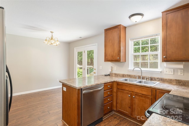 256 Farington Cir Unit 128, Fletcher, NC 28732 - kitchen featuring dishwasher, black range with electric stovetop, a peninsula, and dark wood-type flooring