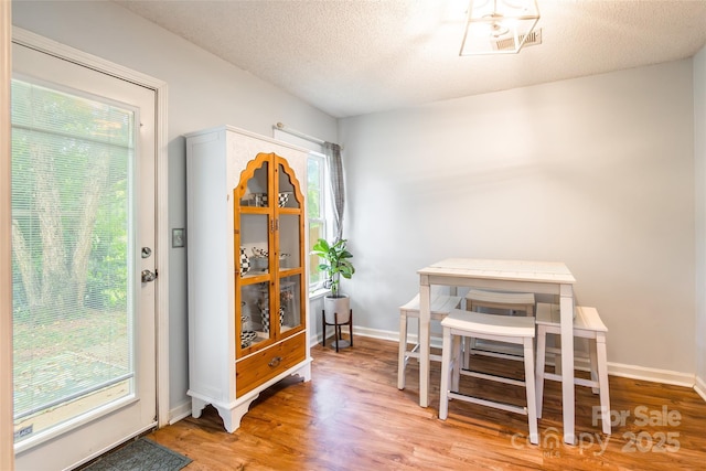 1274 Winding Path Rd, Clover, SC 29710 - dining area with wood finished floors and a textured ceiling