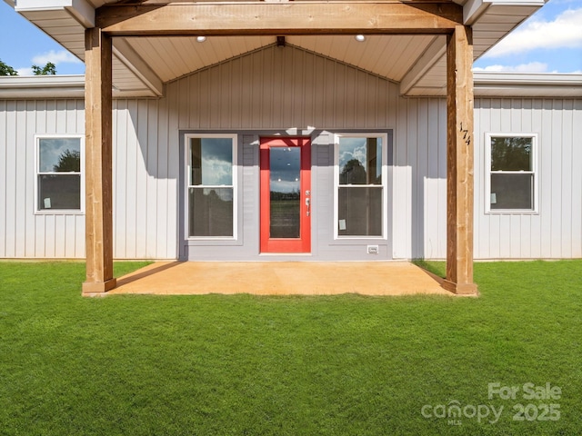 174 Charlie Randall Rd, Lawndale, NC 28090 - view of exterior entry with a patio area and a lawn